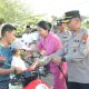 Kapolres Sergai Berbagi Takjil ke Pengendara dan Santuni Anak Yatim